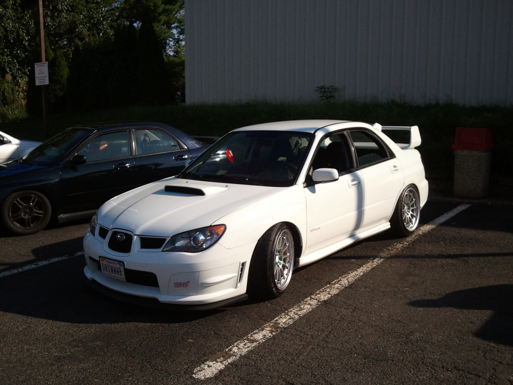 photo 5 Subaru Impreza WRX STi custom wheels Enkei NT03+M 18x9.5, ET +22, tire size 235/40 R18. x ET 