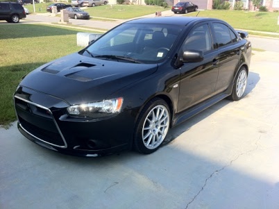photo 1 Mitsubishi Lancer Evolution custom wheels OEM  18x8.5, ET +38, tire size 215/45 R18. x ET 