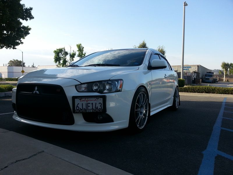 photo 3 Mitsubishi Lancer custom wheels OZ Racing UltraLeggera 18x9.0, ET +35, tire size 235/40 R18. x ET