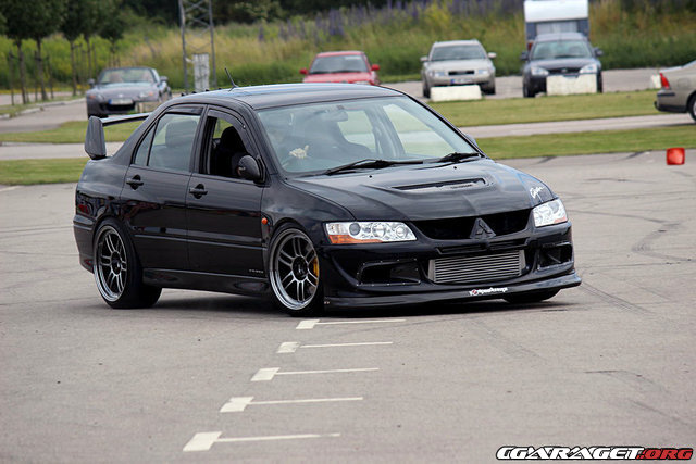 photo 4 Mitsubishi Lancer Evolution custom wheels Enkei RPF1 SBC 18x9.5, ET +15, tire size 235/40 R18. x ET