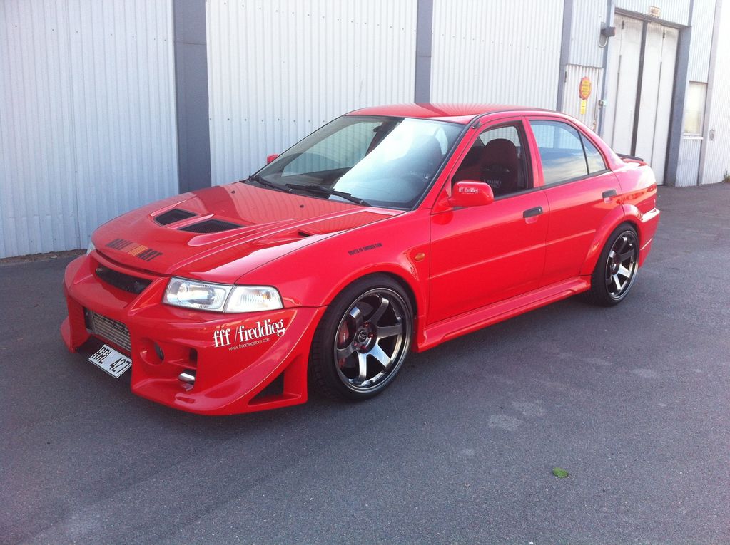 photo 1 Mitsubishi Lancer Evolution custom wheels Rota Grids 18x9.5, ET +20, tire size 225/40 R18. x ET