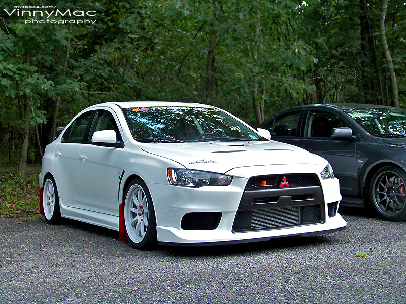 photo 3 Mitsubishi Lancer Evolution custom wheels Rays Engineering Gram Lights 57 Optimise 18x9.5, ET +22, tire size 255/35 R18. x ET 