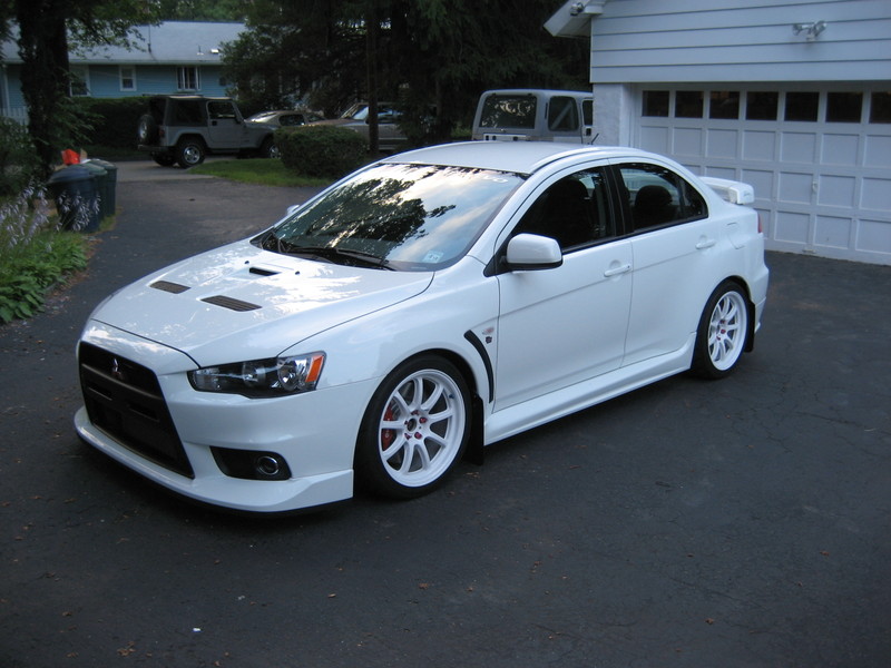 photo 7 Mitsubishi Lancer Evolution custom wheels Rays Engineering Gram Lights 57 Optimise 18x9.5, ET +22, tire size 255/35 R18. x ET 
