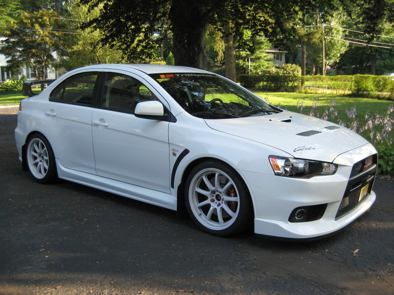 photo 8 Mitsubishi Lancer Evolution custom wheels Rays Engineering Gram Lights 57 Optimise 18x9.5, ET +22, tire size 255/35 R18. x ET 