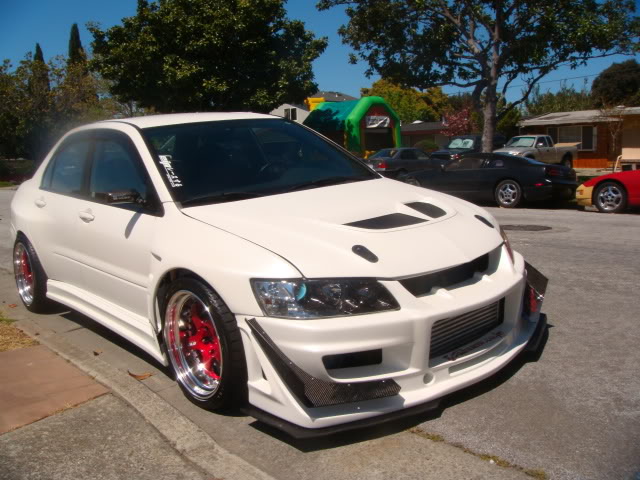 photo 1 Mitsubishi Lancer Evolution custom wheels Work Meister 18x11.0, ET +5, tire size 295/30 R18. x ET